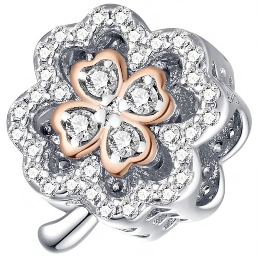 Charms Koniczynka ozdobiony białymi cyrkoniami i centralnym detalem w kolorze rose gold. Elegancka zawieszka Amélioré z motywem czterolistnej koniczyny, symbolizującej szczęście i pomyślność, pasująca do bransoletek modułowych Pandora i Apart.